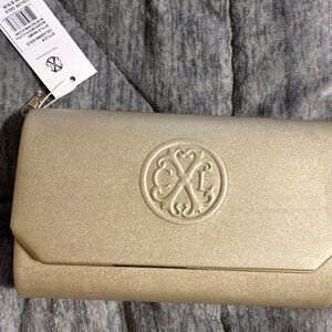 Elegant Gold Clutch Bag by Christian lacroix